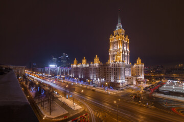Hotel Ukraine and city road at night in Moscow, Russia. Long exposure