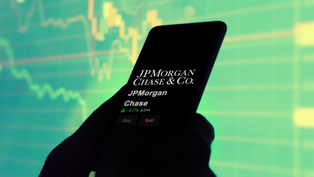 JPMorgan Chase on the screen of an exchange. JPMorgan Chase price stocks, $JPM on a device, New York City, New York, the logo.