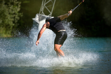 view of a person wakeboarding on a river