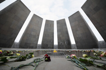  Flowers are on floor in Memorial complex Tsitsernakaberd, dedicated to genocide of armenians in...
