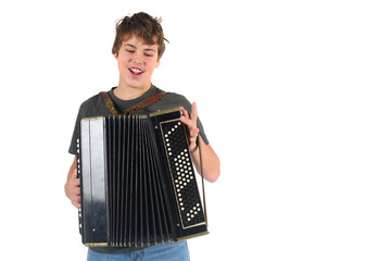 Young boy sings and plays accordion isolated on white background