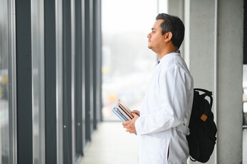 Fototapeta premium Portrait of a young doctor student studying
