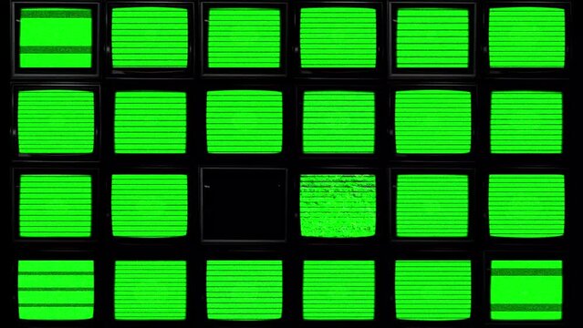 A grid of monitor screens with a green screen effect to key out and replace your own media