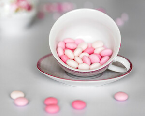 pink and white drops in a cup