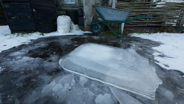 Snow pile, ice, wheelbarrow, water, building, automotive tire, plant