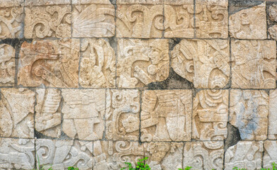 Sunny day with blue sky and white clouds. El Castillo (The Kukulkan Temple) of Chichen Itza, mayan pyramid in Yucatan, Mexico