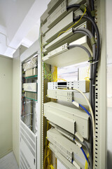 Telecom equipment with cables and switches in communication center