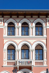Fototapeta na wymiar Facade of historic building on Marshal Tito Street, Porec, Croatia, Istria
