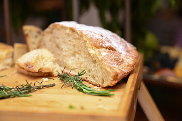 bread with rosemary, bread with fresh herbs, bread on the table, baker's day

