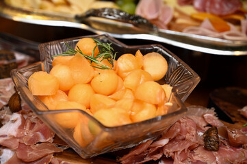 parma ham and melon, party buffet, buffet, self service
