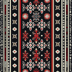 A colorful rug with flowers and other designs