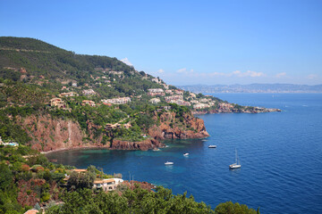Naklejka na ściany i meble Cityscape with many vessels near shore in Cannes, France at summer sunny day