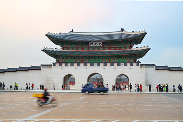  Street with cars near exit to Gyeongbokgung with pagoda. Seoul hosted phantom protest against...