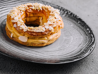 round cake with mendal and custard