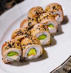 Traditional canada sushi roll on plate