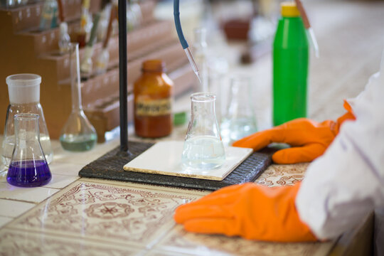 Glass bottle with water for experiment at laboratory