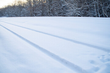 Snow-covered railway tracks. Empty railway in winter.