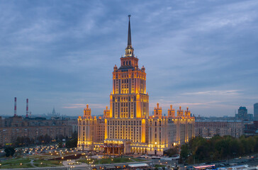 Stalin skyscraper - Ukraine Hotel with illumination at morning in Moscow