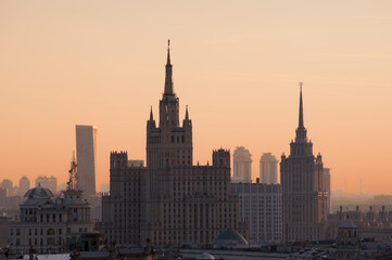 Fototapeta na wymiar Residential house on Kudrinskaya Square and Ukraine hotel (Stalin skyscrapers) at morning in Moscow