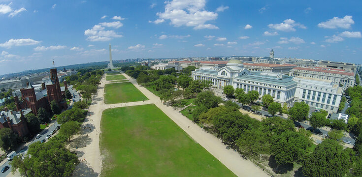 Cityscape with Museum of Natural History and Smithsonian Institution Building not far from Washington Monument on National Mall at summer sunny day in Washington DC. Aerial panorama