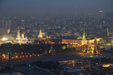 Illuminated Kremlin towers, Under construction Park Zaryadye in center of Moscow, Russia at night