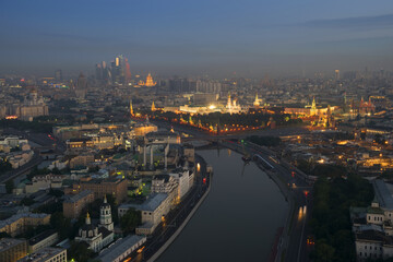 Big Moskvoretsky Bridge, Kremlin with illumination in Moscow, Russia, view from Stalin skyscraper on Kotelnicheskaya quay