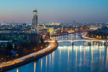 Gateway Bridge, drainage channel and evening panorama of Moscow