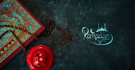 Islamic festive Ramadan Mubarak banner type design, Quran with lantern and tasbih