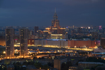 Residential buildings, skyscrapers and roofs at summer night in Moscow, Russia