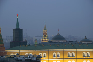 Part of Arsenal building and Spasskaya Tower with illimination at night in Moscow, Russia