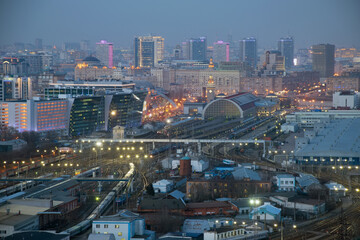 Fototapeta na wymiar Kievsky railway station at night. Russian Railways is among three largest transport companies in world
