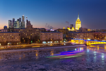 Obraz premium House of Petroleum, Smolensky Metro Bridge, Hotel Ukraine, Moscow City Business Complex at night in Moscow. Long exposure