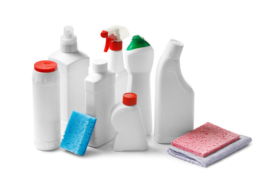 Set of bottles with household chemicals, detergents, cleaners and cleaning tools on a white background.
