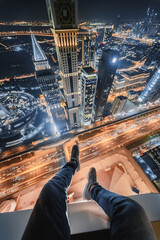 Male legs of rooftop of Millennium Plaza Hotel Dubai on Sheikh Zaid Highway, Tower, Al Yaqoub...
