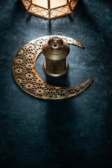 Eid Mubarak background, Golden lantern  with crescent moon on grey colour background