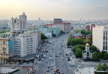 Yakimanka Street with moving cars at spring evening in Moscow, Russia