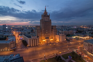 Ministry of Foreign Affairs building with illumination during sunset in Moscow, Russia - obrazy, fototapety, plakaty