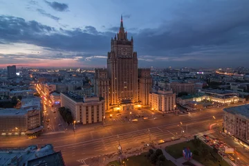 Wall murals Moscow Ministry of Foreign Affairs building with illumination during sunset in Moscow, Russia