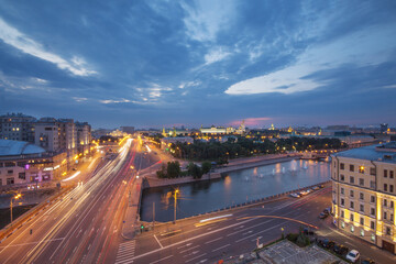 Serafimovich Street, Small stone bridge and Kremlin far away in Moscow evening, long exposure