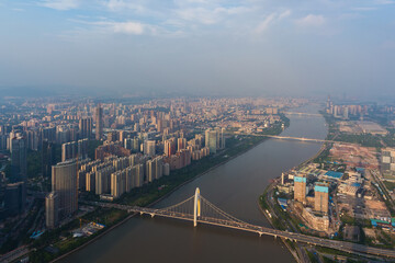Fototapeta premium Bridges ans river at sunny summer day, Guangzhou, China, aerial view