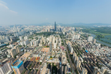 Skyscrapers and residential area of Shenzhen city at sunny day, China