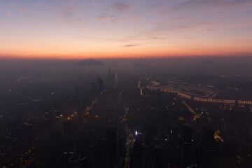Sunrise and cityscape, view from Ping An Finance Centre, Shenzhen, China