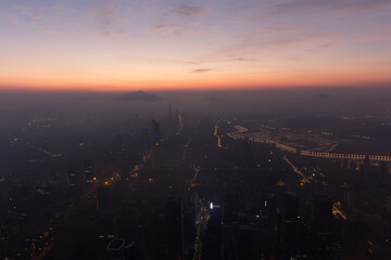Naklejka premium Sunrise and cityscape, view from Ping An Finance Centre, Shenzhen, China