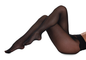 Woman with beautiful long legs wearing black tights on white background, closeup