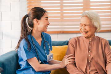 nursing home assistance in health insurance business concept, asian woman doctor or nurse caregiver support health care to elderly senior patient person, caretaker in medicals care recovery service - 755751526