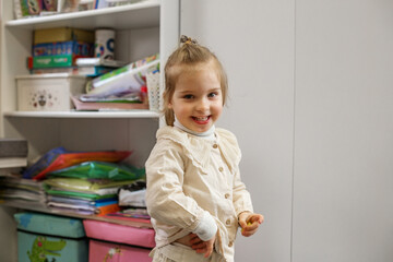 Fototapeta premium Smiling Toddler Girl in Playroom