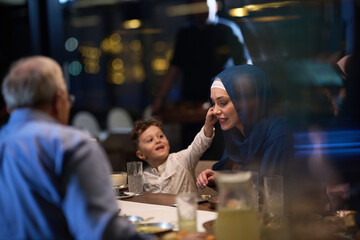In a heartwarming scene, a happy European Islamic family and a young girl delightfully engage with...