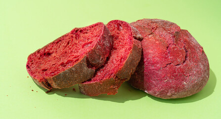 Beetroot purple buns on green background.