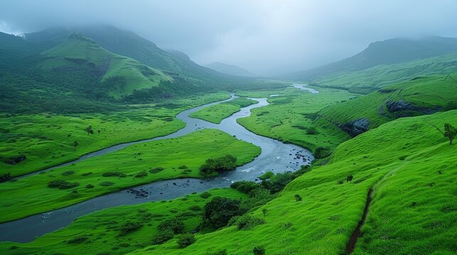 Scenic view of a river flowing through a beautiful green valley