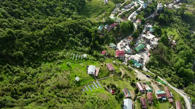 Jang town deep in the  jang valley in tawang district of arunachal pradesh and surrounded by high mountains on a bright morning, western arunachal pradesh in India.